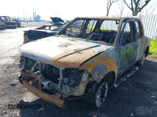 2014 Nissan Frontier SV with VIN 1N6AD0ER1EN735044, listed as a IAAI auction lot 41228247 with Not Provided miles and . Bid and sale history available at DreamBid. Image 2.