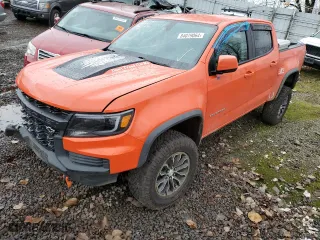2021 Chevrolet Colorado 4WD ZR2 with VIN 1GCGTEEN5M1142481, listed as a Copart auction lot 84079064 with 80,884 mi miles and Salvage Title. Bid and sale history available at carsss.com. Image 1.