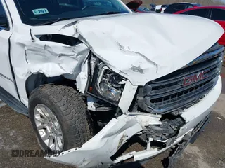 2019 GMC Yukon XL SLT with VIN 1GKS1GKC0KR330715, listed as a IAAI auction lot 41758626 with 134,641 mi miles. Bid and sale history available at carsss.com. Image 6.
