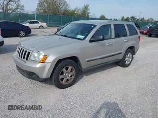 2008 Jeep Grand Cherokee Laredo with VIN 1J8GR48K88C107253, listed as a IAAI auction lot 42018165 with 239,222 mi miles. Bid and sale history available at carsss.com. Image 2.