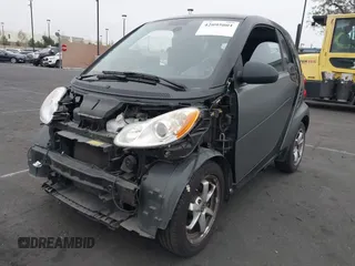 2015 Smart fortwo Passion with VIN WMEEJ3BA1FK787744, listed as a IAAI auction lot 42095001 with 43,370 mi miles and . Bid and sale history available at DreamBid. Image 2.