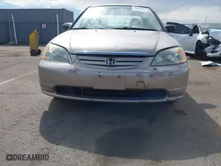 2001 Honda Civic LX with VIN 2HGES16511H554168, listed as a IAAI auction lot 42009621 with 163,801 mi miles. Bid and sale history available at carsss.com. Image 18.