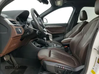 2019 BMW X1 sDrive28i with VIN WBXHU7C57K3H44192, listed as a Copart auction lot 49882335 with 79,350 mi miles and Salvage Title. Bid and sale history available at carsss.com. Image 7.