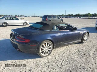 2006 Aston Martin DB9 z VIN SCFAB02A96GB04608, wystawiony jako Copart lot #76550654 z przebiegiem Nie podano mil oraz Nie do naprawy. Historia ofert i sprzedaży dostępna na DreamBid. Obrazek 3.