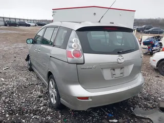 2007 Mazda 5 Touring with VIN JM1CR29L570139627, listed as a IAAI auction lot 41153270 with 90,228 mi miles and . Bid and sale history available at carsss.com. Image 3.