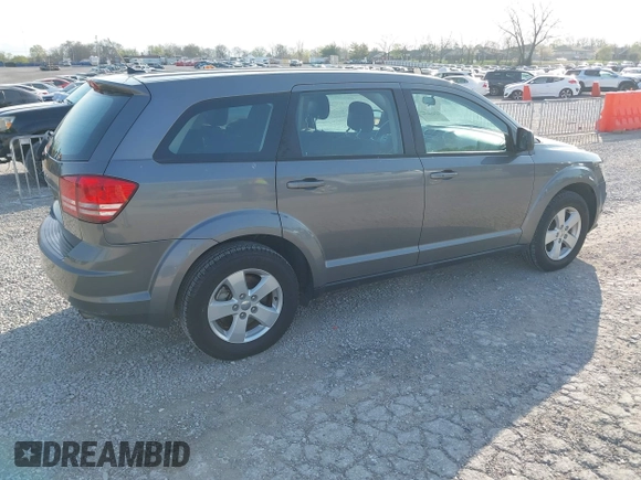 2013 Dodge Journey American Value with VIN 3C4PDCAB2DT501243, listed as a IAAI auction lot 41928930 with 147,437 mi miles and . Bid and sale history available at DreamBid. Image 4.