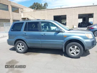 2007 Honda Pilot EX with VIN 2HKYF18447H520522, listed as a IAAI auction lot 42018937 with 128,401 mi miles. Bid and sale history available at carsss.com. Image 13.