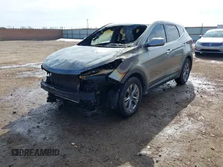 2016 Hyundai Santa Fe z VIN 5XYZTDLB7GG326076, wystawiony jako IAAI lot #41435551 z przebiegiem Nie podano mil oraz . Historia ofert i sprzedaży dostępna na DreamBid. Obrazek 2.