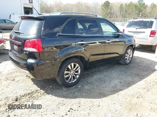 2011 Kia Sorento SX with VIN 5XYKW4A21BG160335, listed as a IAAI auction lot 41844704 with 242,375 mi miles. Bid and sale history available at carsss.com. Image 4.