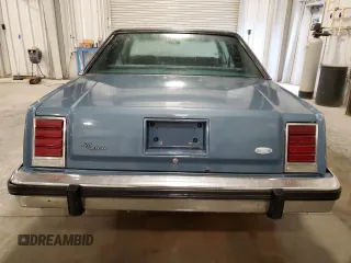 1987 Ford Crown Victoria z VIN 2FABP71F2HX156902, wystawiony jako Copart lot #74368944 z przebiegiem 77 708 mil mil oraz Szkoda całkowita • Salvage title. Historia ofert i sprzedaży dostępna na DreamBid. Obrazek 6.