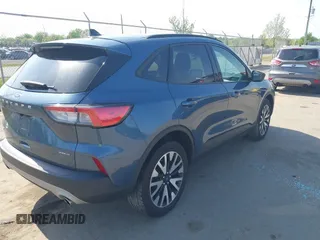 2020 Ford Escape SE Sport Hybrid with VIN 1FMCU9BZ6LUC38008, listed as a IAAI auction lot 42143784 with 81,804 mi miles and . Bid and sale history available at DreamBid. Image 4.