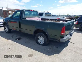 2002 Ford F-150 XL with VIN 1FTRF18232NB18258, listed as a IAAI auction lot 42123898 with 152,214 mi miles and . Bid and sale history available at DreamBid. Image 3.