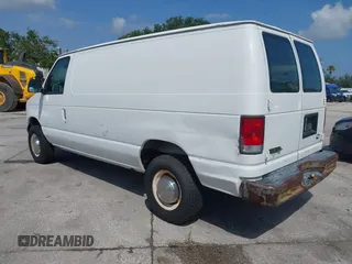2001 Ford Econoline Cargo z VIN 1FTNE24291HB20980, wystawiony jako IAAI lot #42396814 z przebiegiem 182 594 mil mil oraz . Historia ofert i sprzedaży dostępna na DreamBid. Obrazek 3.