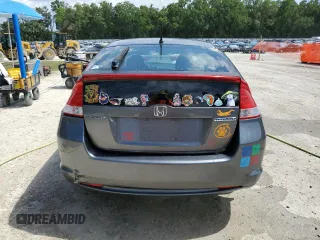 2011 Honda Insight EX z VIN JHMZE2H78BS000453, wystawiony jako Copart lot #58771715 z przebiegiem 183 326 mil mil oraz Szkoda całkowita • Salvage title. Historia ofert i sprzedaży dostępna na DreamBid. Obrazek 6.