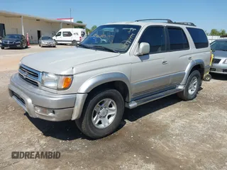 2000 Toyota 4Runner Limited with VIN JT3GN87R1Y0164022, listed as a IAAI auction lot 41990999 with 337,094 mi miles and . Bid and sale history available at DreamBid. Image 2.