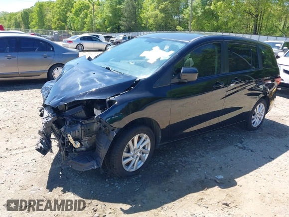 2012 Mazda 5 Sport with VIN JM1CW2BL4C0104669, listed as a IAAI auction lot 42048877 with 115,660 mi miles and . Bid and sale history available at DreamBid. Image 18.