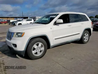 2011 Jeep Grand Cherokee Laredo with VIN 1J4RR4GG2BC617810, listed as a Copart auction lot 62424125 with 205,945 mi miles and Salvage title. Bid and sale history available at DreamBid. Image 1.