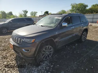 2017 Jeep Grand Cherokee Overland z VIN 1C4RJFCG0HC762612, wystawiony jako Copart lot #57400095 z przebiegiem 122 702 mil mil oraz Szkoda całkowita • Salvage title. Historia ofert i sprzedaży dostępna na DreamBid. Obrazek 1.