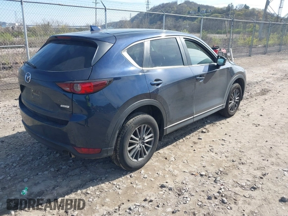 2019 Mazda CX-5 Touring with VIN JM3KFBCM8K0518806, listed as a IAAI auction lot 42038168 with 61,449 mi miles and . Bid and sale history available at DreamBid. Image 4.
