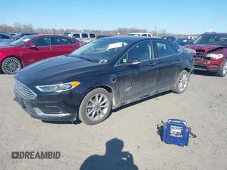 2018 Ford Fusion Energi SE with VIN 3FA6P0PU8JR152890, listed as a IAAI auction lot 41682965 with 84,890 mi miles. Bid and sale history available at carsss.com. Image 2.