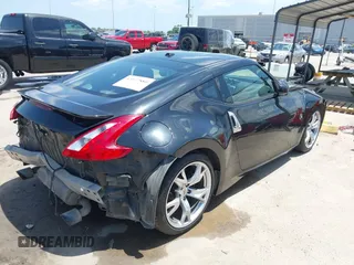 2012 Nissan 370Z z VIN JN1AZ4EH1CM564630, wystawiony jako IAAI lot #42177880 z przebiegiem 173 751 mil mil oraz . Historia ofert i sprzedaży dostępna na DreamBid. Obrazek 4.