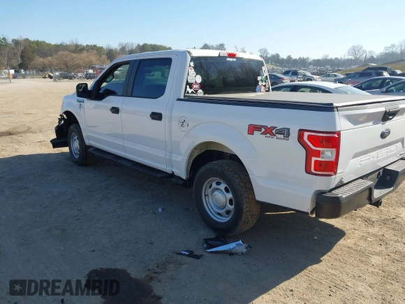 2019 Ford F-150 XL with VIN 1FTEW1EP8KKD98520, listed as a IAAI auction lot 41775566 with 128,021 mi miles. Bid and sale history available at carsss.com. Image 3.