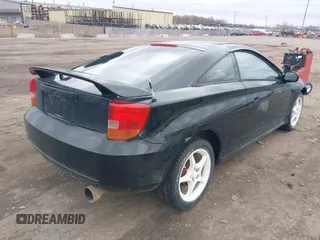 2000 Toyota Celica GT with VIN JTDDR32T7Y0006809, listed as a IAAI auction lot 41860933 with 262,014 mi miles. Bid and sale history available at carsss.com. Image 4.