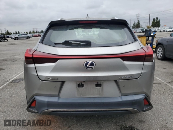 2019 Lexus UX 250h z VIN JTHU9JBH0K2003941, wystawiony jako Copart lot #53476155 z przebiegiem 94 603 mil mil oraz Szkoda całkowita • Salvage title. Historia ofert i sprzedaży dostępna na DreamBid. Obrazek 6.