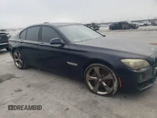 2011 BMW 7 Series 750i with VIN WBAKA8C5XBCY37073, listed as a Copart auction lot 76238914 with 129,493 mi miles and Clean title. Bid and sale history available at DreamBid. Image 4.