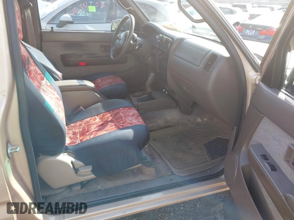 1999 Toyota Tacoma PreRunner with VIN 4TASN92NXXZ563923, listed as a IAAI auction lot 41588706 with 348,134 mi miles and . Bid and sale history available at DreamBid. Image 5.