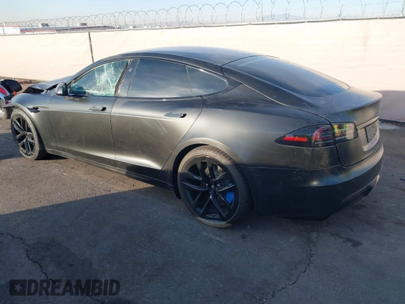 2022 Tesla Model S with VIN 5YJSA1E57NF493457, listed as a IAAI auction lot 41456284 with Not Provided miles and . Bid and sale history available at DreamBid. Image 3.