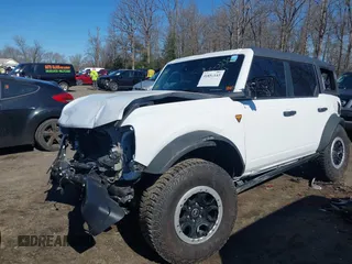 2023 Ford Bronco with VIN 1FMEE5DP0PLC12557, listed as a IAAI auction lot 41854143 with 9,839 mi miles. Bid and sale history available at carsss.com. Image 2.