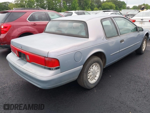 1995 Mercury Cougar z VIN 1MELM62W3SH600097, wystawiony jako IAAI lot #42185484 z przebiegiem 216 393 mil mil oraz . Historia ofert i sprzedaży dostępna na DreamBid. Obrazek 4.