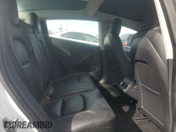 2023 Tesla Model 3 with VIN 5YJ3E1EA9PF546149, listed as a Copart auction lot 52104365 with 34,105 mi miles and Salvage Title. Bid and sale history available at DreamBid. Image 10.