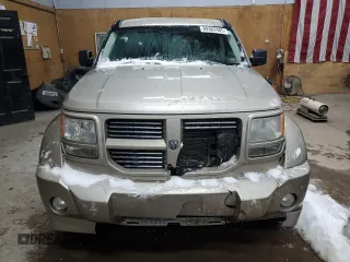 2010 Dodge Nitro SXT z VIN 1D4PU5GK8AW124381, wystawiony jako Copart lot #89302485 z przebiegiem 115 947 mil mil oraz Czysty tytuł • Clean title. Historia ofert i sprzedaży dostępna na DreamBid. Obrazek 5.