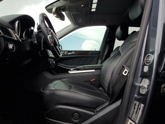2014 Mercedes-Benz GL 450 z VIN 4JGDF7CE3EA402706, wystawiony jako Copart lot #59056875 z przebiegiem 131 460 mil mil oraz Szkoda całkowita • Salvage title. Historia ofert i sprzedaży dostępna na DreamBid. Obrazek 7.
