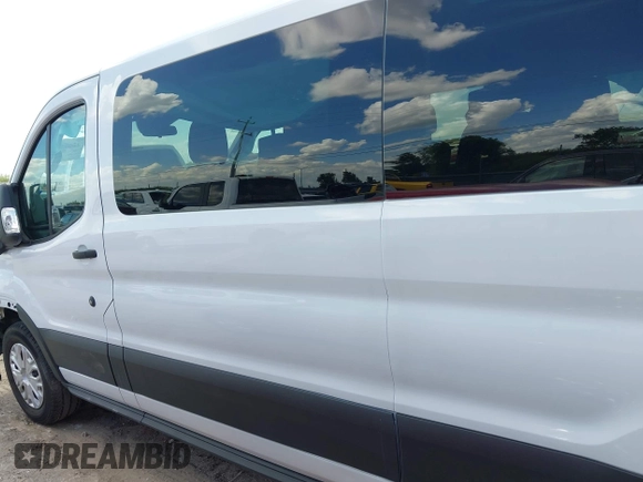 2023 Ford Transit Passenger XL z VIN 1FBAX2Y8XPKA68850, wystawiony jako IAAI lot #42603923 z przebiegiem 37 840 mil mil oraz . Historia ofert i sprzedaży dostępna na DreamBid. Obrazek 14.