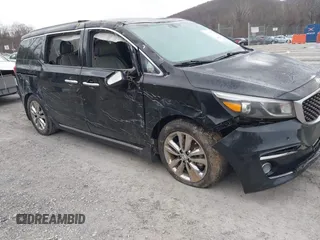 2016 Kia Sedona SX-L with VIN KNDME5C13G6184930, listed as a IAAI auction lot 41385207 with 136,447 mi miles and . Bid and sale history available at carsss.com. Image 1.