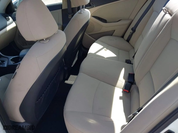 2015 Kia Optima LX with VIN KNAGM4A76F5597167, listed as a IAAI auction lot 41896660 with 82,939 mi miles. Bid and sale history available at carsss.com. Image 8.