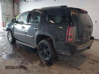 2011 GMC Yukon Denali with VIN 1GKS2EEF2BR258374, listed as a IAAI auction lot 41653820 with 227,468 mi miles. Bid and sale history available at carsss.com. Image 3.