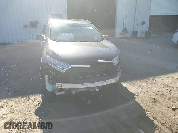 2018 Honda CR-V Touring with VIN 2HKRW1H94JH507406, listed as a Copart auction lot 86980214 with 76,527 mi miles and Salvage Title. Bid and sale history available at DreamBid. Image 11.