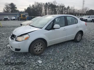 2013 Suzuki SX4 LE with VIN JS2YC5A37D6101979, listed as a Copart auction lot 42185855 with 118,855 mi miles and Salvage Title. Bid and sale history available at carsss.com. Image 1.