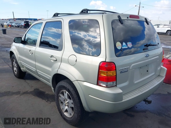 2004 Ford Escape Limited z VIN 1FMCU04104KA41934, wystawiony jako IAAI lot #41444706 z przebiegiem 169 347 mil mil oraz . Historia ofert i sprzedaży dostępna na DreamBid. Obrazek 3.