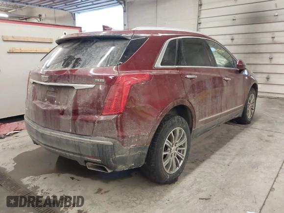 2017 Cadillac XT5 Luxury AWD with VIN 1GYKNDRS4HZ257413, listed as a IAAI auction lot 41537197 with 124,184 mi miles and . Bid and sale history available at DreamBid. Image 4.