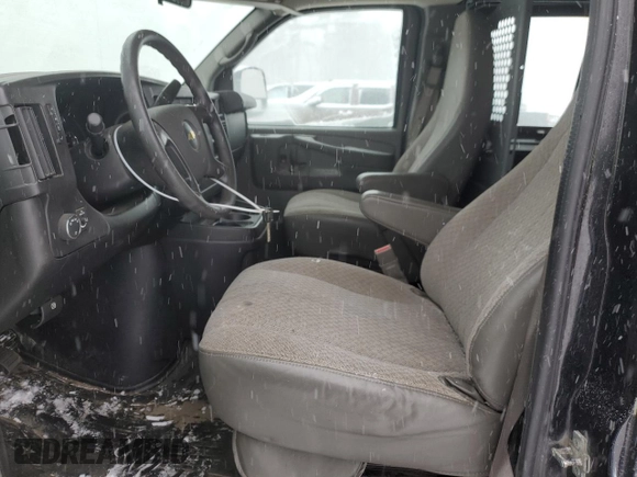 2015 Chevrolet Express Cargo with VIN 1GCWGFCF2F1176687, listed as a Copart auction lot 44706785 with 131,216 mi miles and Salvage title. Bid and sale history available at DreamBid. Image 7.