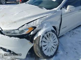 2014 Ford Fusion SE Hybrid with VIN 3FA6P0LU8ER192043, listed as a IAAI auction lot 41617422 with 131,772 mi miles. Bid and sale history available at carsss.com. Image 6.