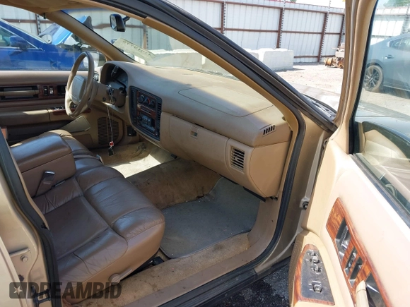 1996 Chevrolet Caprice Classic 1SA Special Value Pkg with VIN 1G1BL52P9TR190980, listed as a IAAI auction lot 42019775 with 135,432 mi miles. Bid and sale history available at carsss.com. Image 5.