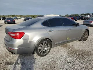 2014 Kia Cadenza Premium with VIN KNALN4D70E5129232, listed as a Copart auction lot 76173074 with 135,856 mi miles and Salvage Title. Bid and sale history available at carsss.com. Image 3.