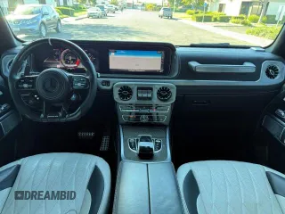 2021 Mercedes-Benz G 63 AMG with VIN W1NYC7HJXMX397464, listed as a Copart auction lot 76418314 with 19,811 mi miles and Salvage Title. Bid and sale history available at DreamBid. Image 9.