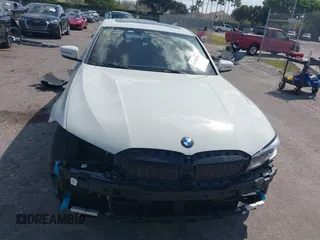 2022 BMW 3 Series 330i with VIN 3MW5R1J04N8C75820, listed as a IAAI auction lot 41702506 with 17,421 mi miles. Bid and sale history available at carsss.com. Image 13.